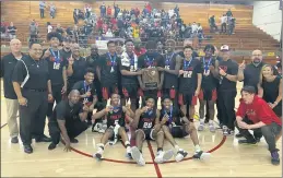  ?? PHOTO BY ERIC-PAUL JOHNSON ?? Etiwanda players and coaches show off the championsh­ip plaque after beating Torrey Pines to win the CIF State Open Division SoCal Regional regional title on Saturday.