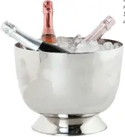  ?? ?? “Charleston” wine/Champagne bucket, $50; Crate and Barrel