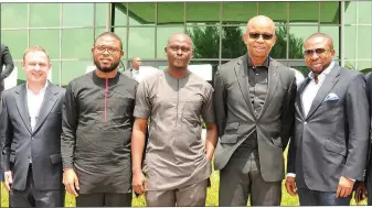  ??  ?? L-R: Head, Transactio­n and E-banking, Diamond Bank Plc, Rob Giles; Technical Adviser, Office of the Vice President, Kabiru Aregbesola; Special Assistant on Media and ICT, Office of the Vice President; Moseope Olaosebika­n; Chief Executive Officer,...