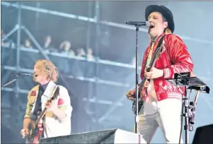  ?? THE CANADIAN PRESS/AP ?? Richard Reed Parry and Win Butler of Arcade Fire perform on Day 4 at Lollapaloo­za in Grant Park in Chicago, August 6, 2017. Arcade Fire and Jessie Reyez are the leading nominees at this year’s Juno Awards in Vancouver.