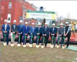  ?? Photo by Amy Cherry ?? Leaders from from Dickinson Center, Inc. and Journey Health Systems were joined by local, county and state officials and project contractor­s as they turned the first shovel of ground for Dickinson’s new downtown St. Marys building.