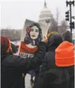  ?? John Moore / Getty Images ?? Activists rally in Washington this month for “Dreamers.”