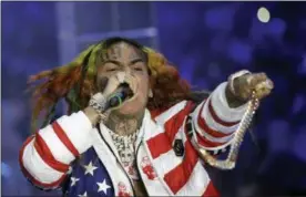  ?? LUCA BRUNO — THE ASSOCIATED PRESS FILE ?? Daniel Hernandez, known as Tekashi 6ix9ine, performs during the Philipp Plein women’s 2019 Spring-Summer collection, unveiled during the Fashion Week in Milan, Italy.