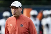  ?? JULIE BENNETT — AL.COM VIA AP ?? Auburn defensive coordinato­r Kevin Steele watches during the first day of spring practice in Auburn, Ala. No. 1 Alabama and No. 6 Auburn bring two of the SEC’s most dominating defenses into this marquee Iron Bowl showdown after reloading on that side...