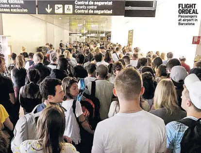  ??  ?? FLIGHT ORDEAL Passengers at airport in Barcelona