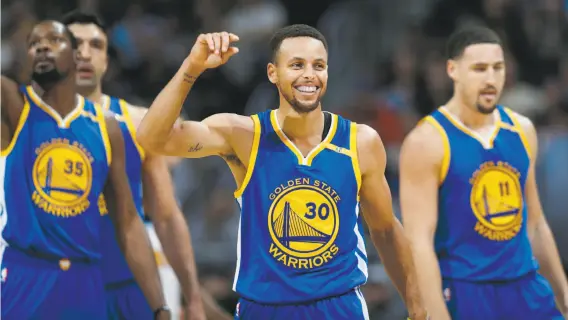  ?? David Zalubowski / Associated Press 2016 ?? With Kevin Durant (left), Stephen Curry and Klay Thompson — as well as Draymond Green — the Warriors introduced a star-heavy model of roster constructi­on.