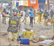  ?? PTI FILE ?? Police personnel and protesters clash during a rally against the amended Citizenshi­p Act and NRC in Mangaluru on Dec 19.