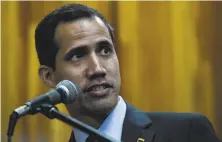  ?? Federico Parra / AFP / Getty Images ?? Venezuela’s opposition leader and self-proclaimed acting president Juan Guaido has the backing of President Trump.