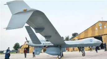  ??  ?? An American-built MQ-9 Guardian is presented to the media at the Hellenic Air Force’s Larissa base, in central Greece, in a 2019.