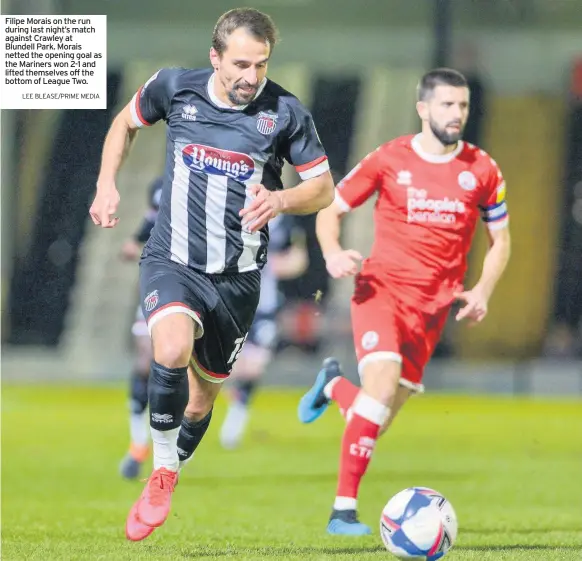  ?? LEE BLEASE/PRIME MEDIA ?? Filipe Morais on the run during last night’s match against Crawley at Blundell Park. Morais netted the opening goal as the Mariners won 2-1 and lifted themselves off the bottom of League Two.