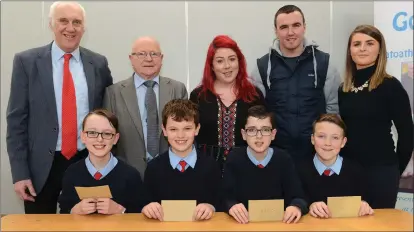  ??  ?? Joe Daly, Cormac Murphy, Jack Daly and Conor Phelan Realt Na Mara Donacarney 2nd B Section. Back, Bernard Clarke Ratoath Credit Union , Tommy Weir Drogheda Credit Union , Teachers Karen Gerrard, Niall Arthur and Fiona Mc Bride at the Chapter 6 Credit...