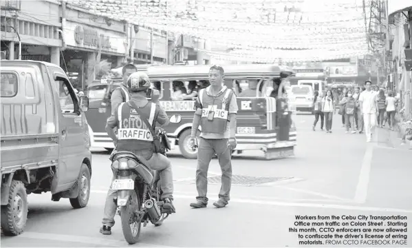  ?? FROM CCTO FACEBOOK PAGE ?? Workers from the Cebu City Transporta­tion Office man traffic on Colon Street . Starting this month, CCTO enforcers are now allowed to confiscate the driver's license of erring motorists.