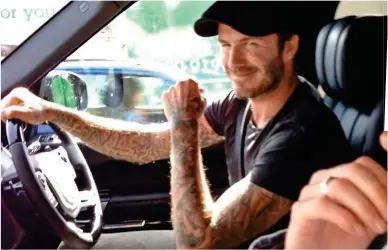  ??  ?? Luxury motor: Former England ace David Beckham behind the wheel of another Bentley