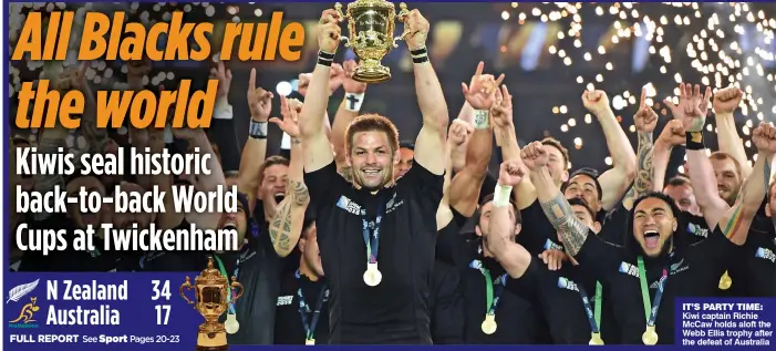  ??  ?? IT’S PARTY TIME: Kiwi captain Richie McCaw holds aloft the Webb Ellis trophy after the defeat of Australia