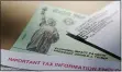  ?? ERIC GAY — THE ASSOCIATED PRESS ?? Stimulus checks, paused student loan payments and the need to stay at home may have helped you cut back on your debt for the first time. Keep that momentum going and take control of your finances.