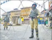  ?? PTI FILE ?? Security personnel stand guard during restrictio­ns in Srinagar on October 18, 2019.