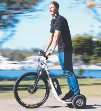  ?? Picture: GLENN HAMPSON ?? Liam Turner takes a DC-Tri for a test ride at Broadwater Parklands.