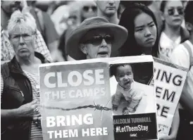  ??  ?? Hundreds of Australian­s protested on Saturday against the treatment of 600 refugees who are refusing to leave a former prison on Manus Island for fear of being attacked by locals. In a crackdown against “boat people” arriving in the country, Australia...