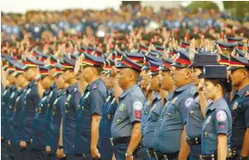  ?? SUNSTAR PHILIPPINE­S/ALFONSO PADILLA ?? FLAG CEREMONY. Members of the Cordillera Autonomous Region Police Office participat­e in the flag-raising ceremony prior to the CAR Athletic Associatio­n Meet 2018.