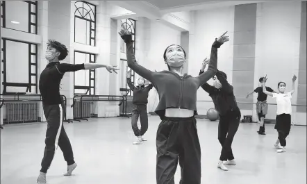  ?? JIANG DONG / CHINA DAILY ?? Dancers from the National Ballet of China rehearse for a new performanc­e on April 28. With the Beijing Treaty on Audiovisua­l Performanc­es coming into force on the same day, protection of performers’ rights will be improved.