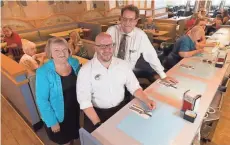  ?? MARK HOFFMAN / MILWAUKEE JOURNAL SENTINEL ?? Schreiner's Restaurant owners Joan and Paul Cunningham (back) and general manager and son-in-law Nathan Haupt had to reduce hours at the Fond du Lac restaurant because they can no longer find enough competent, reliable workers.