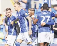  ??  ?? EARLY CELEBRATIO­N Bluebirds after Fletcher’s own goal