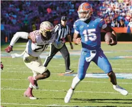  ?? JOHN RAOUX/AP ?? Florida State linebacker Kalen DeLoach, who started 11 games last season and finished third on the team in tackles with 69, chases down Florida quarterbac­k Anthony Richardson.