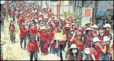  ?? AFP ?? Protesters march in Mogok in Myanmar’s Mandalay.