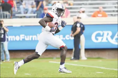  ?? Ryan M. Kelly / Getty Images ?? UConn freshman running back Kevin Mensah is the team’s second-leading rusher.