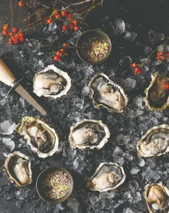  ?? PHOTOS: REBECCA WELLMAN ?? Raw oysters are a must for French New Year's celebratio­ns, say cookbook authors Laura Bradbury and Rebecca Wellman. And an apple mignonette takes the flavour experience to a new level.