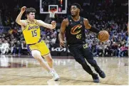  ?? RON SCHWANE / ASSOCIATED PRESS ?? Cavaliers guard Donovan Mitchell scored 43 points to upstage LeBron James in the Lakers’ only visit to Cleveland this season.