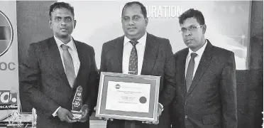  ??  ?? From left: Financial Accountant Harsha Deeptha, Group Chief Executive Officer Dr. Prasad Medawatta, and Chief Financial Officer Badrajith Siriwardan­a