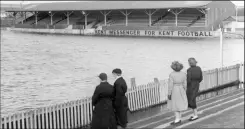  ??  ?? Water polo would have been a more appropriat­e sport at Gravesend’s Northfleet Football ground in 1953