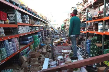  ??  ?? Scene at a supermarke­t in Salinas, Puerto Rico, in the aftermath of Hurricane Maria in September 2017. — Reuters photos