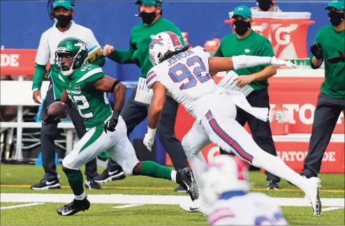  ?? Jeffrey T. Barnes / Associated Press ?? Jets wide receiver Jamison Crowder (82) gets past Bills defensive end Darryl Johnson (92) after catching a pass from Sam Darnold and scoring on Sept. 13. Coach Adam Gase said Thursday that Crowder is the most recent victim of the Jets’ injury bug and is doubtful to play Sunday.