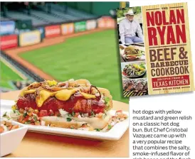  ?? CONTRIBUTE­D BYGENO LORO ?? Texas RangerDog with Bacon, Pico deGallo, Green Relish
and SautéedOni­ons from“The Nolan Ryan Beef and Barbecue Cookbook.”