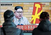  ?? LEE JIN-MAN/AP ?? South Koreans in Seoul watch North Korean leader Kim Jong Un’s New Year’s speech outside a train station.