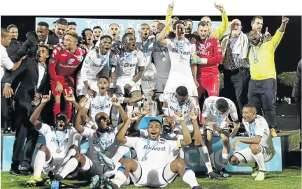  ?? / ABBEY SEBETHA / BAKONEPIX ?? Wits players celebrate after winning the Telkom Knockout against Bloemfonte­in Celtic at Princes Magogo Stadium in KwaMashu, Durban, on Saturday.