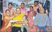  ??  ?? ■ Anupam Mishra (yellow t-shirt) with his family members.