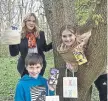  ?? ?? Jake and Isabel Hall with Bellway Sales Advisor Katie Brown at the Easter Egg Hunt in Peterborou­gh