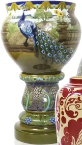  ??  ?? ESTIMATE £4,000–£6,000 Rare large jardinière and stand, 95cm high, decorated with peacocks, designed by Joseph Walmsley