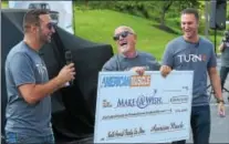  ?? PETE BANNAN – DIGITAL FIRST MEDIA ?? Dennis Heron, president and CEO of Make-A-Wish of Southeaste­rn Pa., center, accepts a $126,751 check from Malvern area-based Turn5 co-founders Steve and Andrew Voudouris.