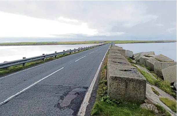  ?? ?? PROJECT: Orkney Islands Council is considerin­g its options for reconstruc­ting the first Churchill Barrier, which links Mainland and Lamb Holm.