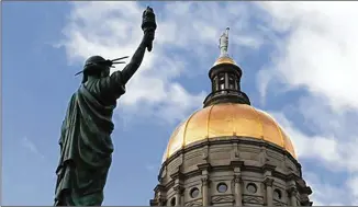  ?? BOB ANDRES/AJC FILE ?? As votes were being counted Wednesday, it was clear Republican­s put a stop to momentum that Democrats built in 2018 when they flipped more than a dozen legislativ­e seats under the Gold Dome.