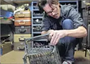  ?? Gravitas Ventures ?? JEREMY MAYER takes apart a machine for use in his art. What would your typewriter teacher think?