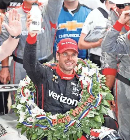  ?? BRIAN SPURLOCK / USA TODAY SPORTS ?? Will Power celebrates during the milk ceremony after winning the Indianapol­is 500.