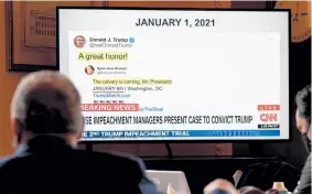  ?? Erin Schaff, © The New York Times Co. ?? A screen shows a tweet sent by Donald Trump days before the storming of the Capitol, during the former president's second impeachmen­t trial at the Capitol in Washington on Wednesday.