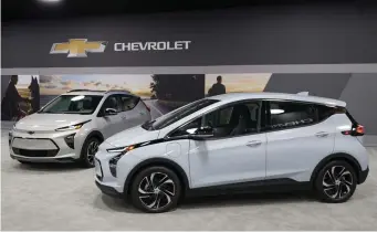  ?? AP File ?? SPARK OF INTEREST: Whether people want them or not, automakers are rolling out multiple new electric vehicle models.