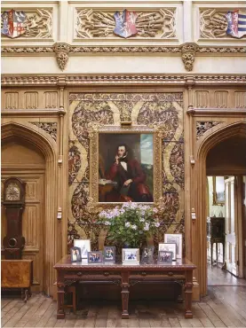  ??  ?? ABOVE RIGHT Rich gothic details, such as linen folding panelling and heraldic shields, characteri­se the decoration of the Saloon, which lies at the core of the house. The walls are hung with elaborate 17th- century embossed and gilded leather panels...