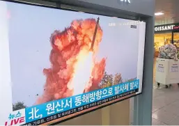  ?? Picture: AP. ?? A TV screen shows a file image of a North Korea missile during a news programme at the Seoul Railway Station, South Korea.